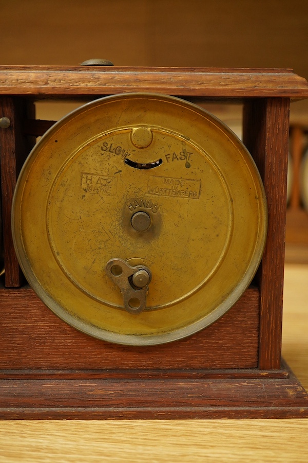 A William Tanner 'The Reliable Chess Timer' in an oak case, stamped to the reverse ‘HAO Make, Made in Wurttemberg’. Condition - fair to good.